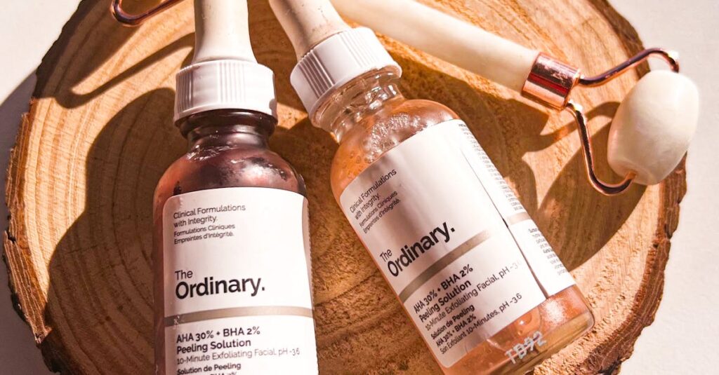 Flat lay of skincare products and facial roller on natural wooden slice for beauty and self-care.